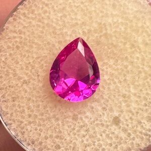 1.85 genuine pink sapphire loose in gem jar